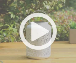 White Flower Cut-Out Metal LED Solar Lantern -Garden Oasis 810607500 V0